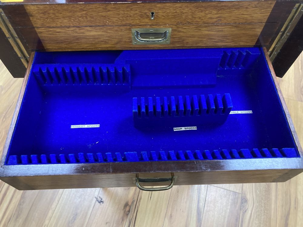 An early 20th century canteen, on stand, with single-lined drawers, lacks contents, width 52cm
